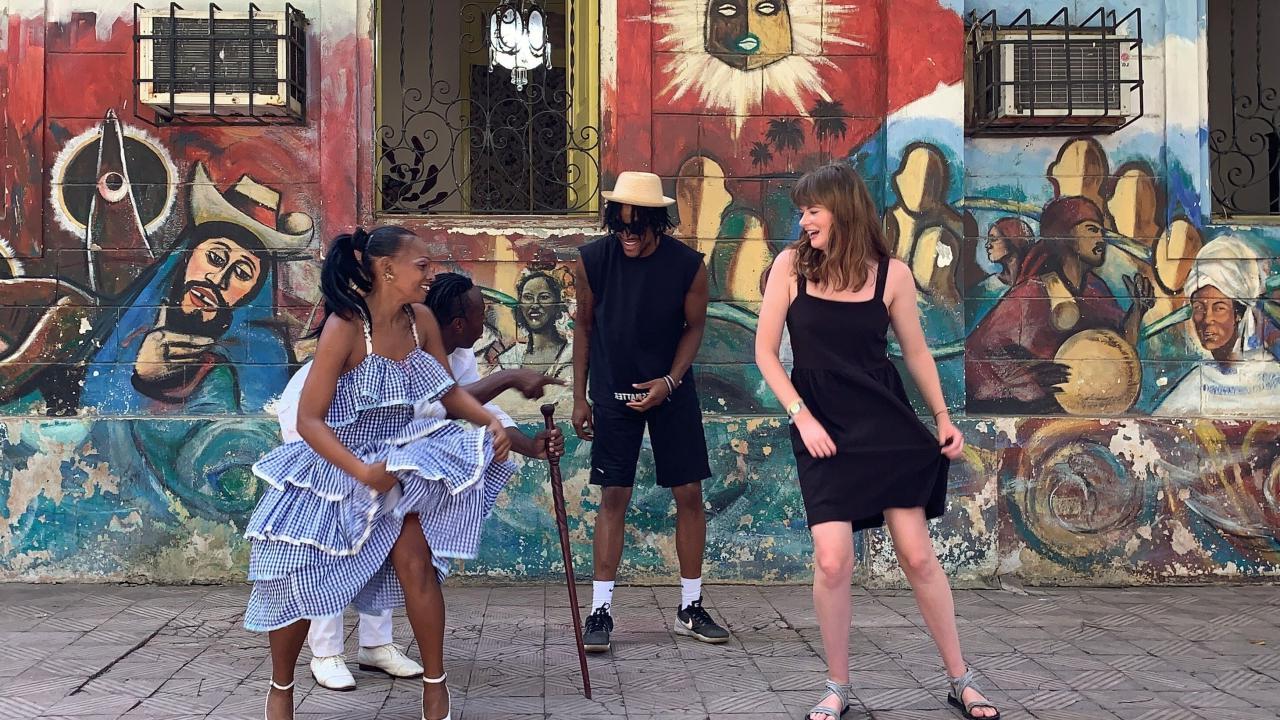 women dancing in the street